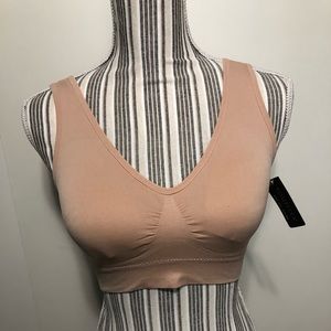 Nude stretchy bra with pad inserts